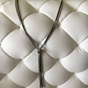 Multi strand necklace with knot finish